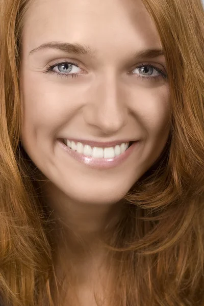 Beautiful smiling woman face — Stock Photo, Image