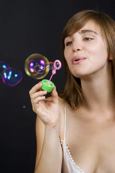 Woman making bubbles — Stock Photo, Image