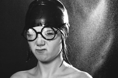 Bizarre woman in swimming cap clipart