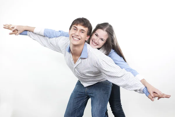 Couple with the hands lifted upwards — Stock Photo, Image