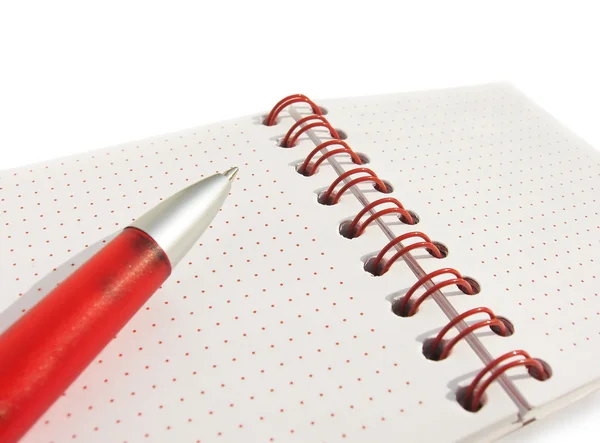 Abra o bloco de notas e uma caneta vermelha — Fotografia de Stock