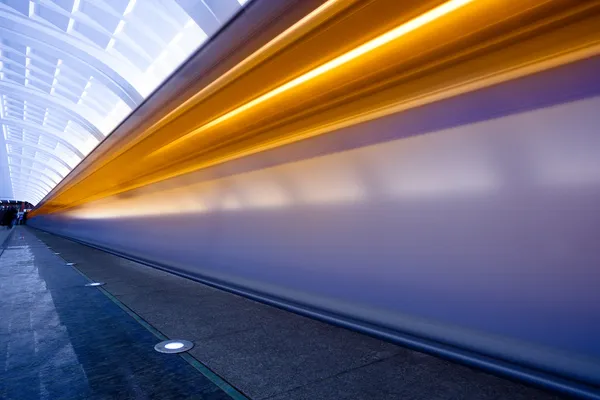 Move trains with orange lights — Stock Photo, Image