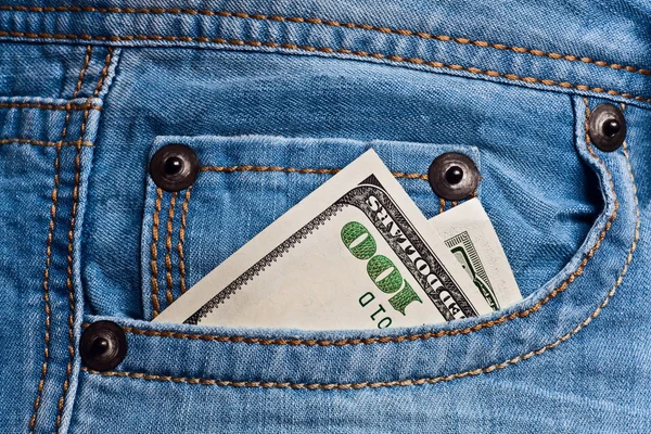 Kapsa džíny s dolarů bankovky — Stock fotografie