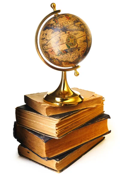 Antique globe on books — Stock Photo, Image