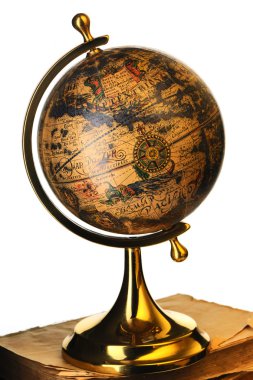 Antique globe on books clipart