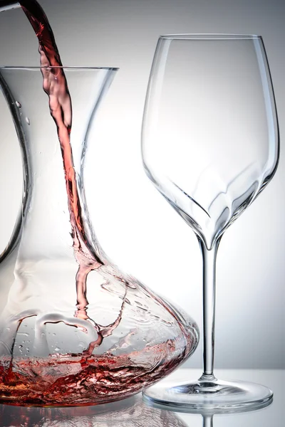 Pouring wine into decanter — Stock Photo, Image