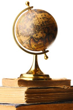 Antique globe on books clipart