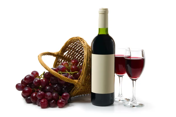 Темное красное вино на белой спине Стоковое Фото