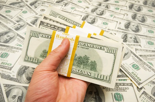 stock image Hand holding american dollars