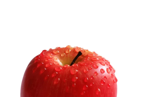 Červené jablko s kapičkami vody — Stock fotografie