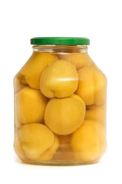 Frasco com pêssegos isolados — Fotografia de Stock