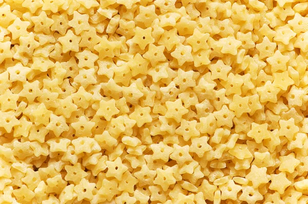 Background made of pasta pieces — Stock Photo, Image