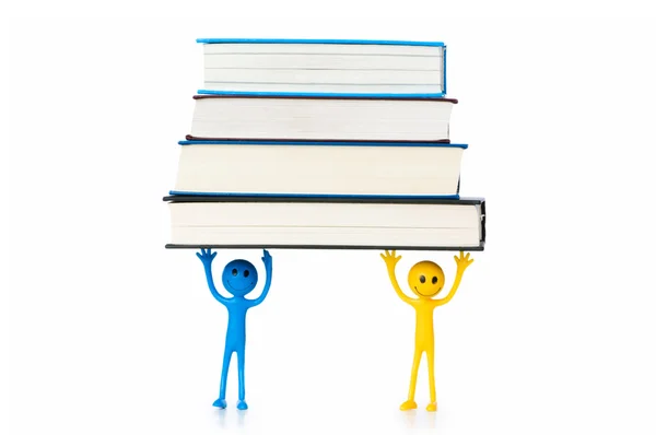 Education concept - books and smilie — Stock Photo, Image