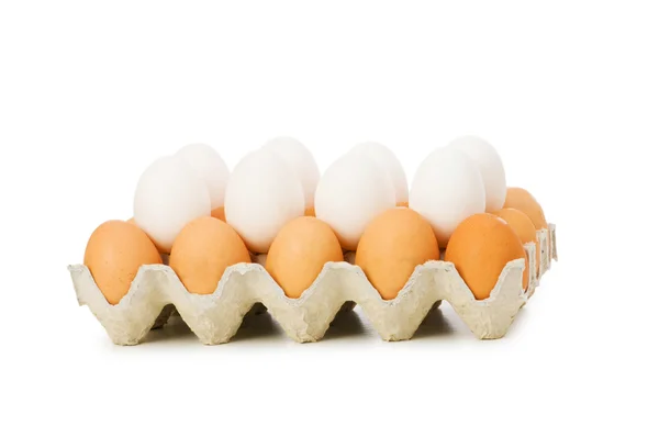 Muchos huevos en el cartón aislados —  Fotos de Stock