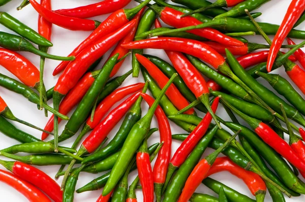 Red and green chili peppers — Stock Photo, Image
