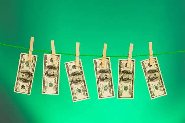 Money laundering concept with dollars — Stockfoto