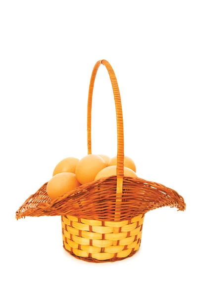 Basket full of eggs isolated — Stock Photo, Image
