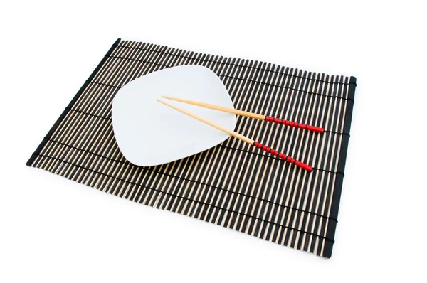 Ätpinnar och plattan på mattan — Stockfoto