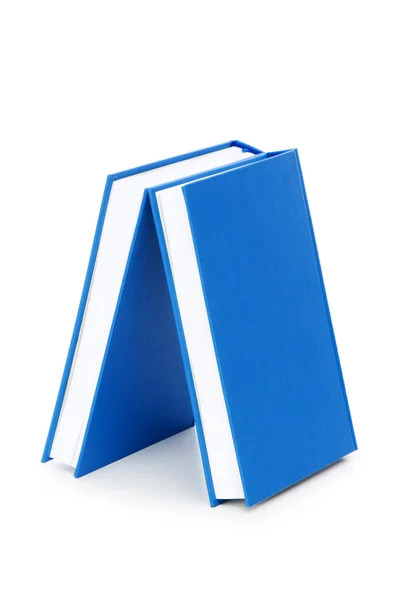 白で隔離される書籍のスタック — ストック写真