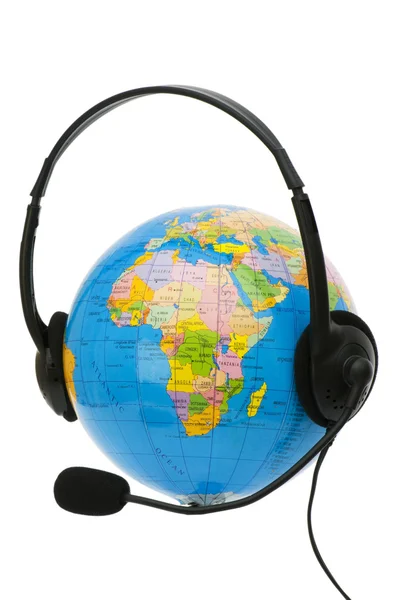 Headset on globe isolated — Stock Photo, Image