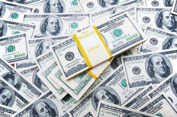 Stack dollar på pengar bakgrund — Stockfoto
