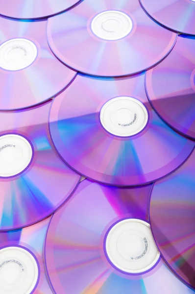 Muchos DVD arreglados en el blanco — Foto de Stock