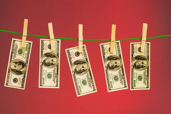 Money laundering concept with dollars — Stockfoto