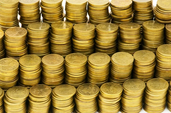 Bliska stosów złote monety — Zdjęcie stockowe