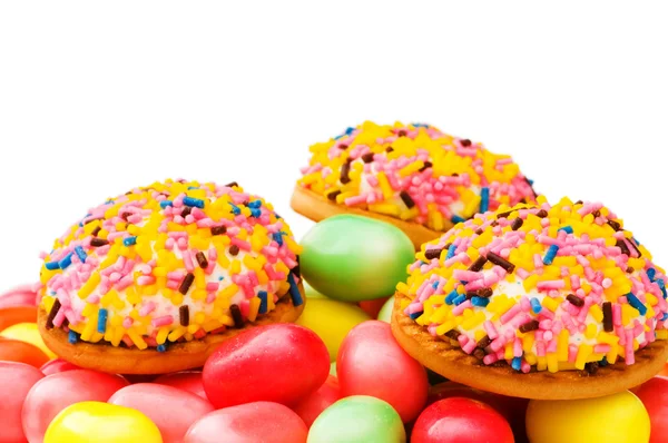 Sweet cakes and colourful gums — Stock Photo, Image