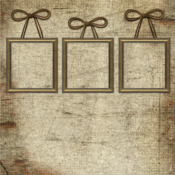 Frames with bow on grunge background — Stock Photo, Image