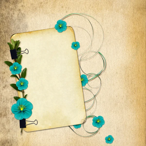 Paper with flowers on old grunge background — Stock Photo, Image