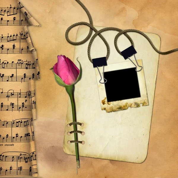 Grunge papier met rose op muzikale achtergrond — Stockfoto