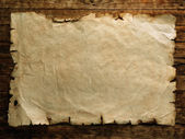 Starý papír na dřevěné desce