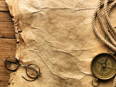 Compass, rope, glasses and old paper