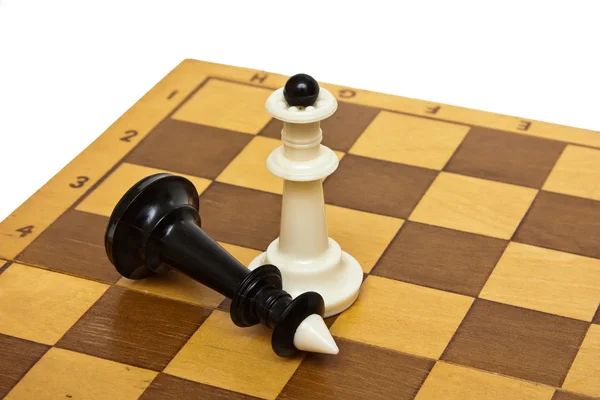 Шахматы и доска — стоковое фото