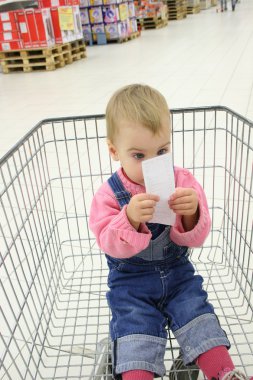 Baby in shopingcart watch check clipart