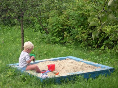 Kid in playpit clipart