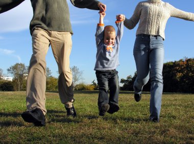 Boy and parent's hands clipart