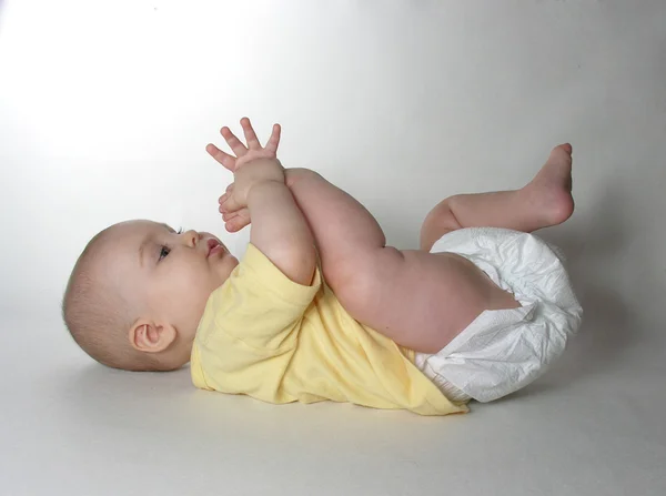 Bebé miente —  Fotos de Stock