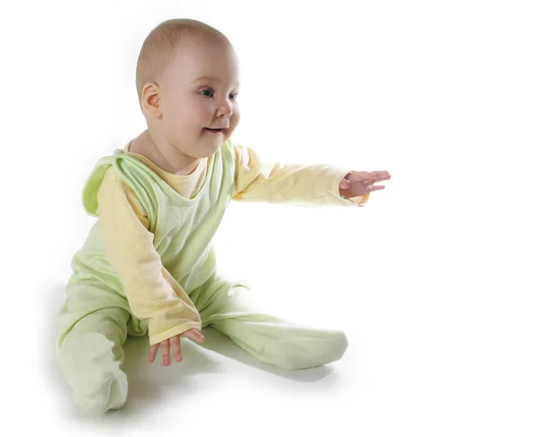Baby mit Hand nach oben auf weiß — Stockfoto