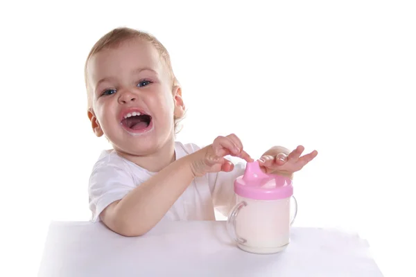 Happy baby with milk — Stock Fotó