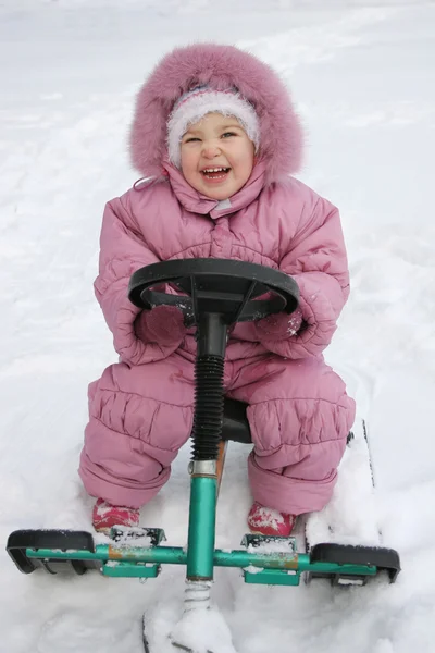 Happy baby on sled — Stock Photo, Image