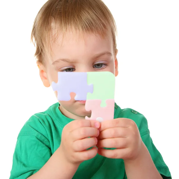 Ребенок с головоломкой — стоковое фото