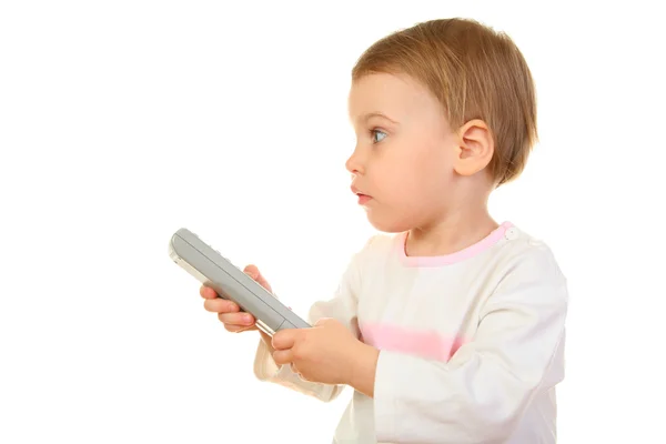 Baby with remote control — Stock Photo, Image