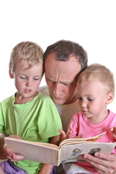 Grandfather read book with children — Stock Photo, Image