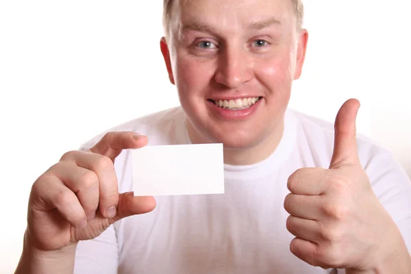 Homem com cartão e polegar para cima — Fotografia de Stock