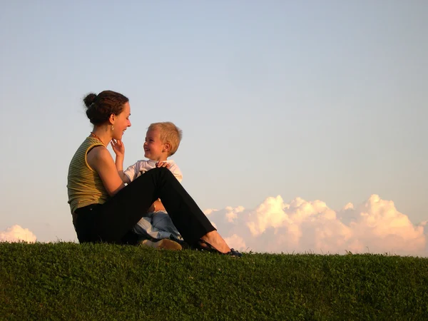 Mother with boy on meadow — Stock Photo, Image