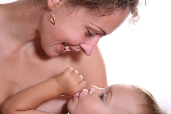Madre con el dedo de succión del bebé —  Fotos de Stock