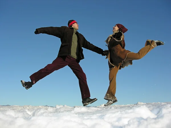 Couple jump. winter — Stock Photo, Image
