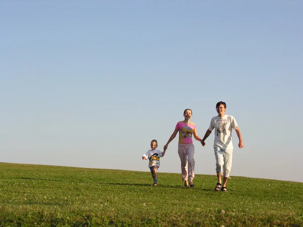 Correndo família — Fotografia de Stock